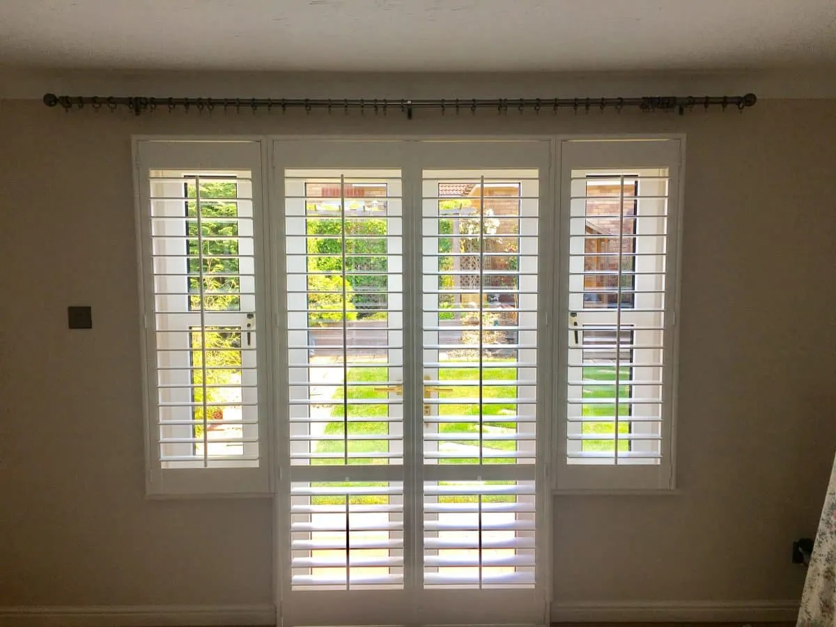 Sliding Patio Doors: Shutters vs. Blinds